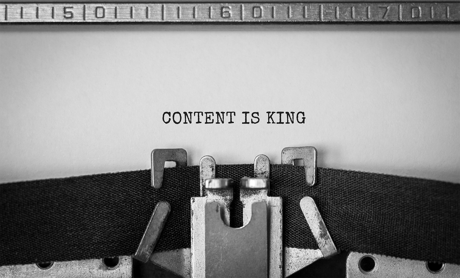 typewriter image saying content is king