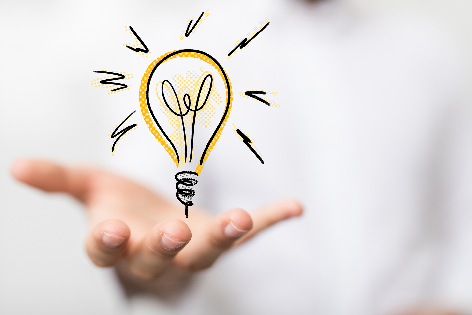 hand held out illustrated lightbulb in hand